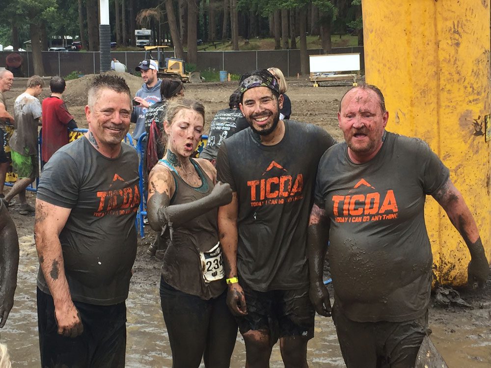 Positively Energized to Get Muddy and Give Back!